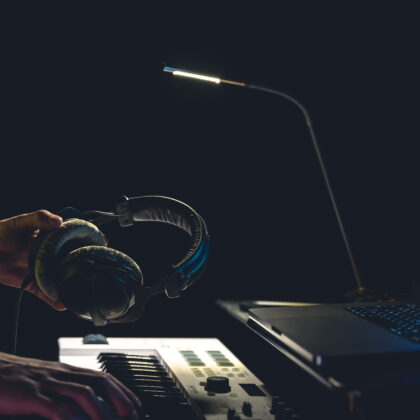 A man composer, producer, arranger, songwriter, musician hands arranging music.